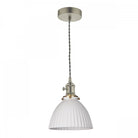 A single pendant light with a white, ribbed, bell-shaped shade and a metal fixture.