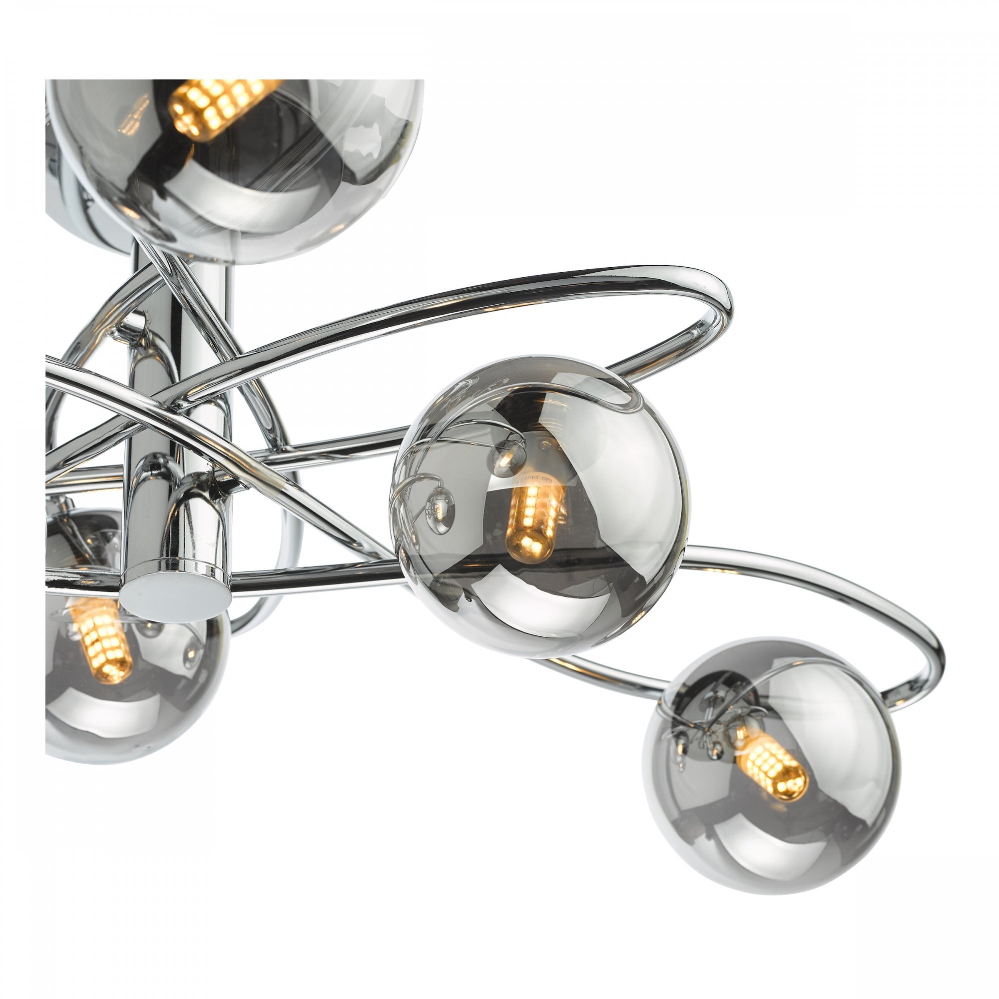 A close-up view of three smoked glass orbs with illuminated bulbs on a chrome light fixture.