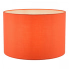 Orange lampshade with a cream interior on a white background.