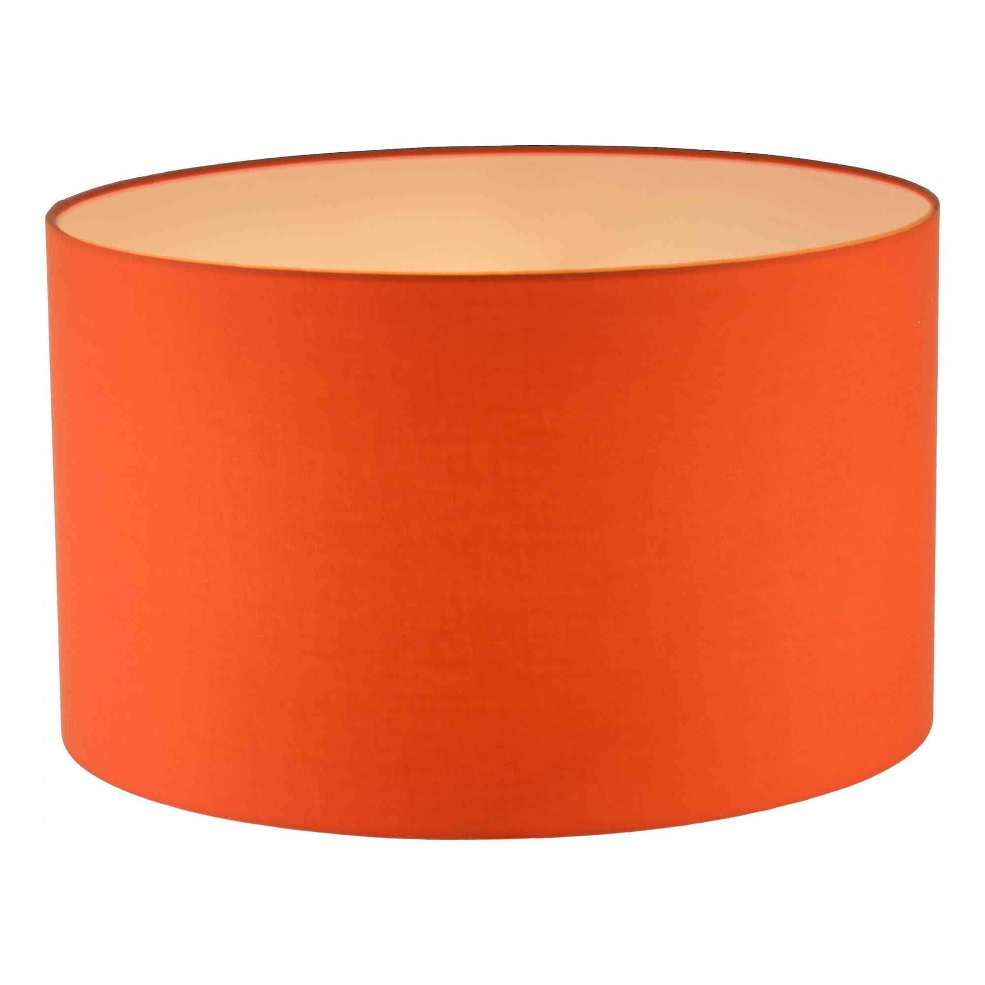 An orange drum lampshade with a white interior.