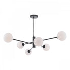 Modern black chandelier with six white spherical lights extending from a central rod.