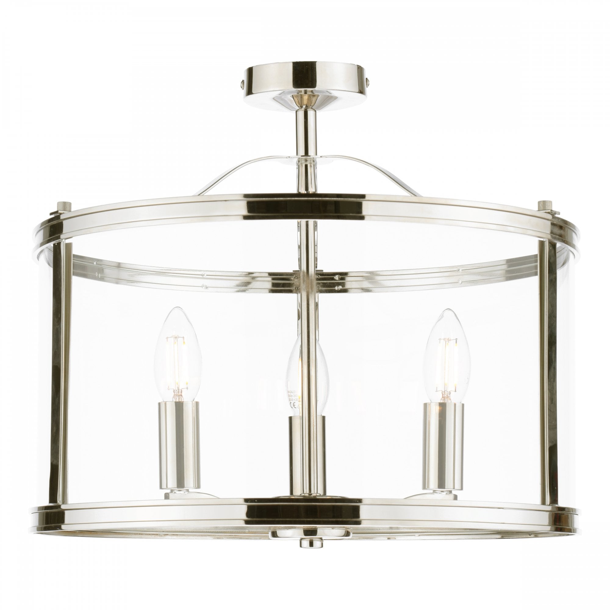 A close-up of a semi-flush chrome ceiling light with a clear glass shade.