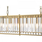 A detailed front view of the rectangular chandelier's clear glass rods and gold frame.