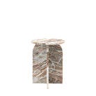 Front view of the round marble side table with an arched base on a white background.