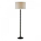 Modern black floor lamp with a textured column stand and a light fabric shade.