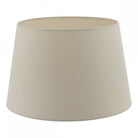 A beige lampshade, wider at the bottom than the top.