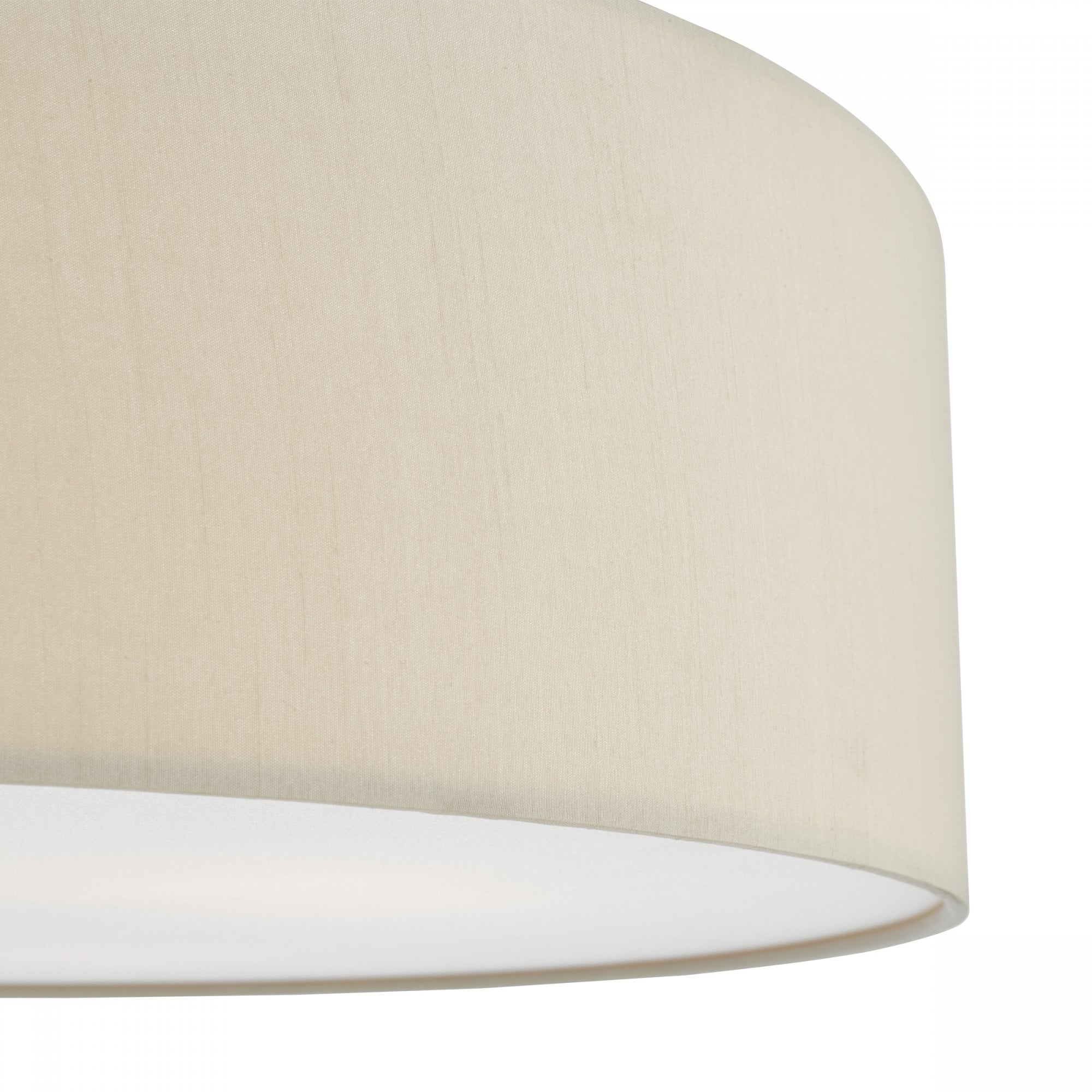 A close-up view of a cream-colored fabric ceiling light, highlighting the texture.