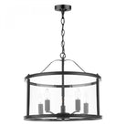 A sleek black chandelier with a circular glass enclosure and four exposed bulbs on a white background.