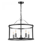 A minimalist black chandelier with a clear glass drum shade, featuring four visible bulbs.