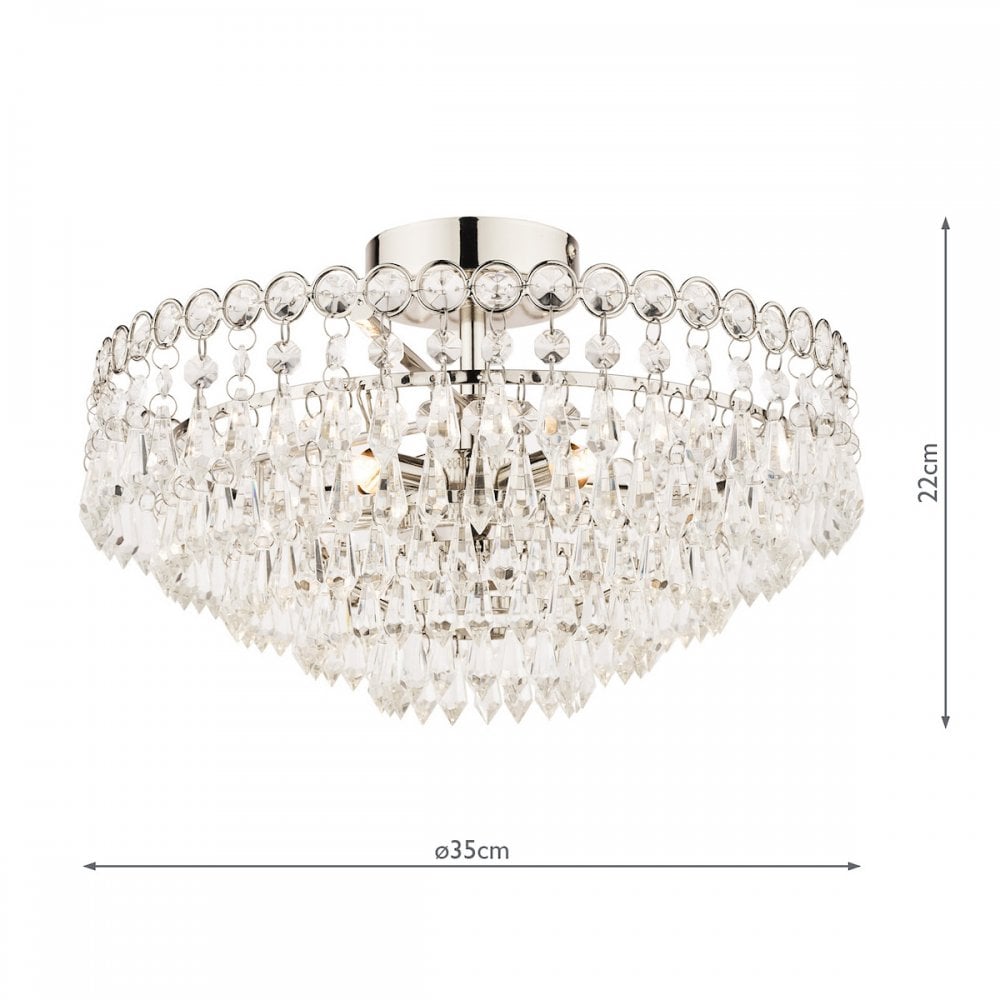 A close-up view of a crystal chandelier with its measurements labeled.