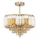 A dazzling gold and clear crystal chandelier provides elegant lighting.