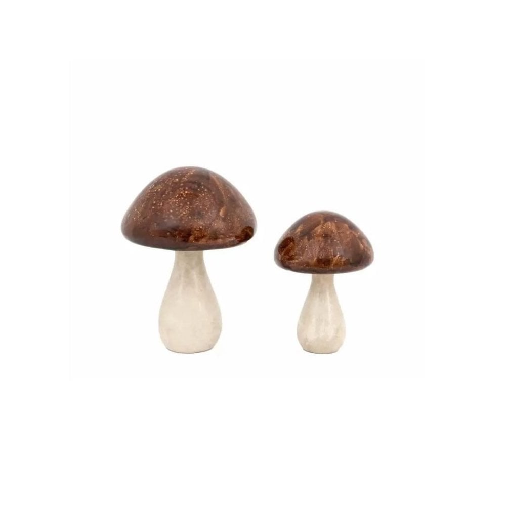 Two decorative mushroom ornaments, one larger than the other, on a white background.