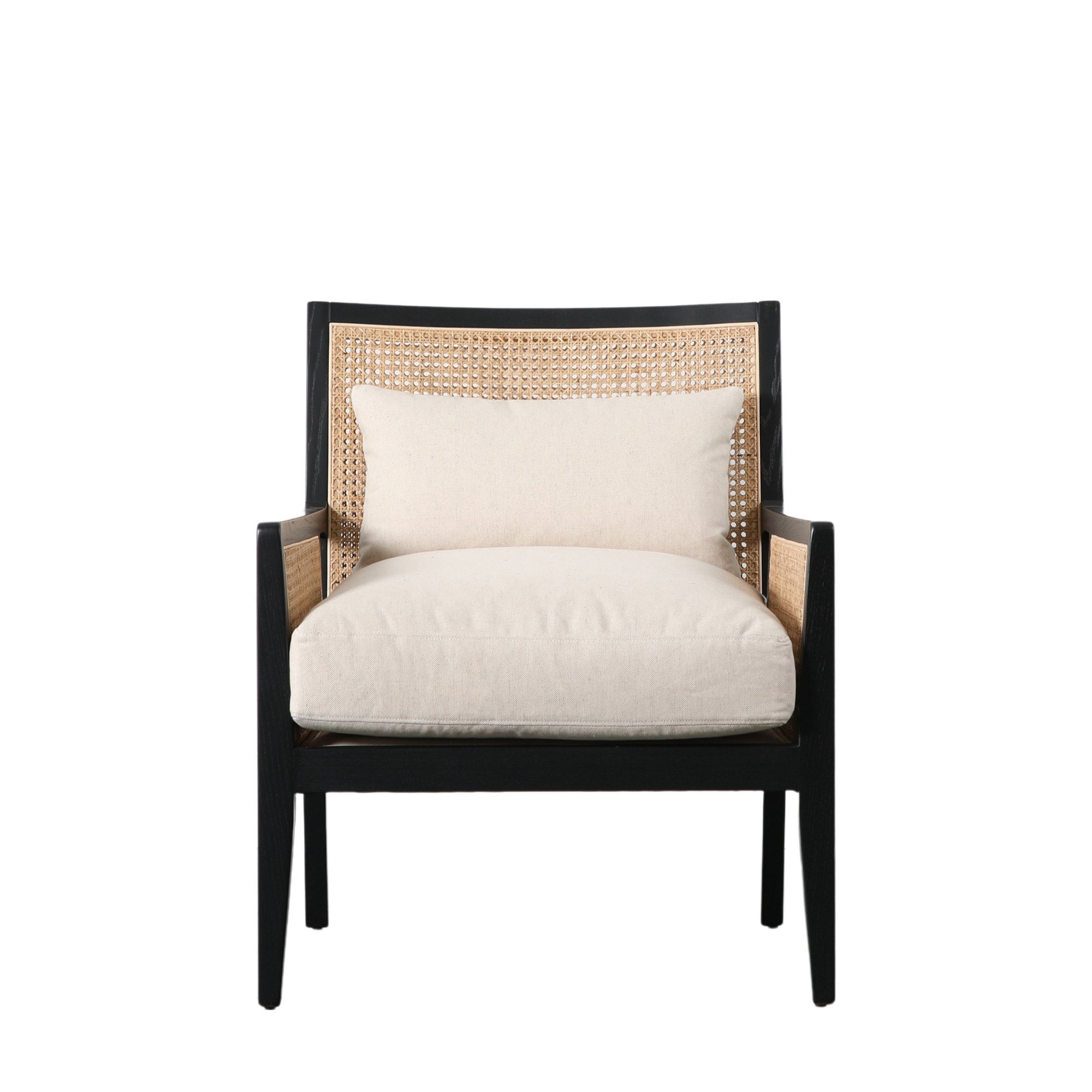 Front view of the black wooden armchair with cane panels and light cream cushions.