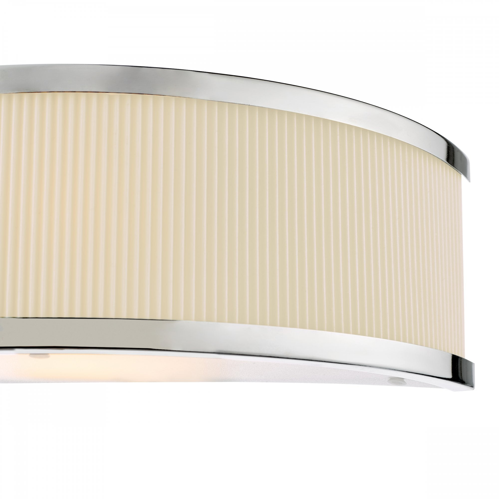 Close-up of a wall light with a ribbed cream shade and polished chrome accents.