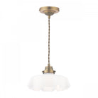 A brass pendant light with a white fluted glass shade on a white background.