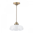 A brass pendant light with a white fluted glass shade on a white background.