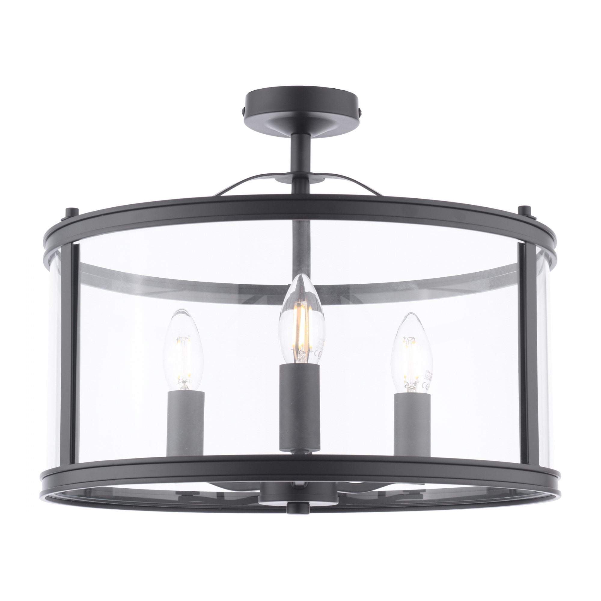 A modern black semi-flush ceiling light with a clear glass drum shade and three visible bulbs.