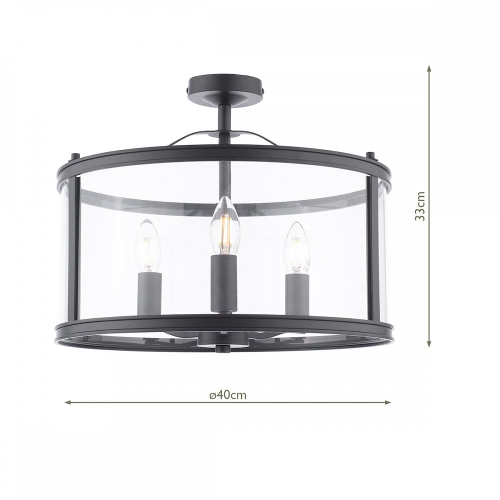 Black semi-flush ceiling light with clear glass drum shade and three bulbs, showing dimensions.