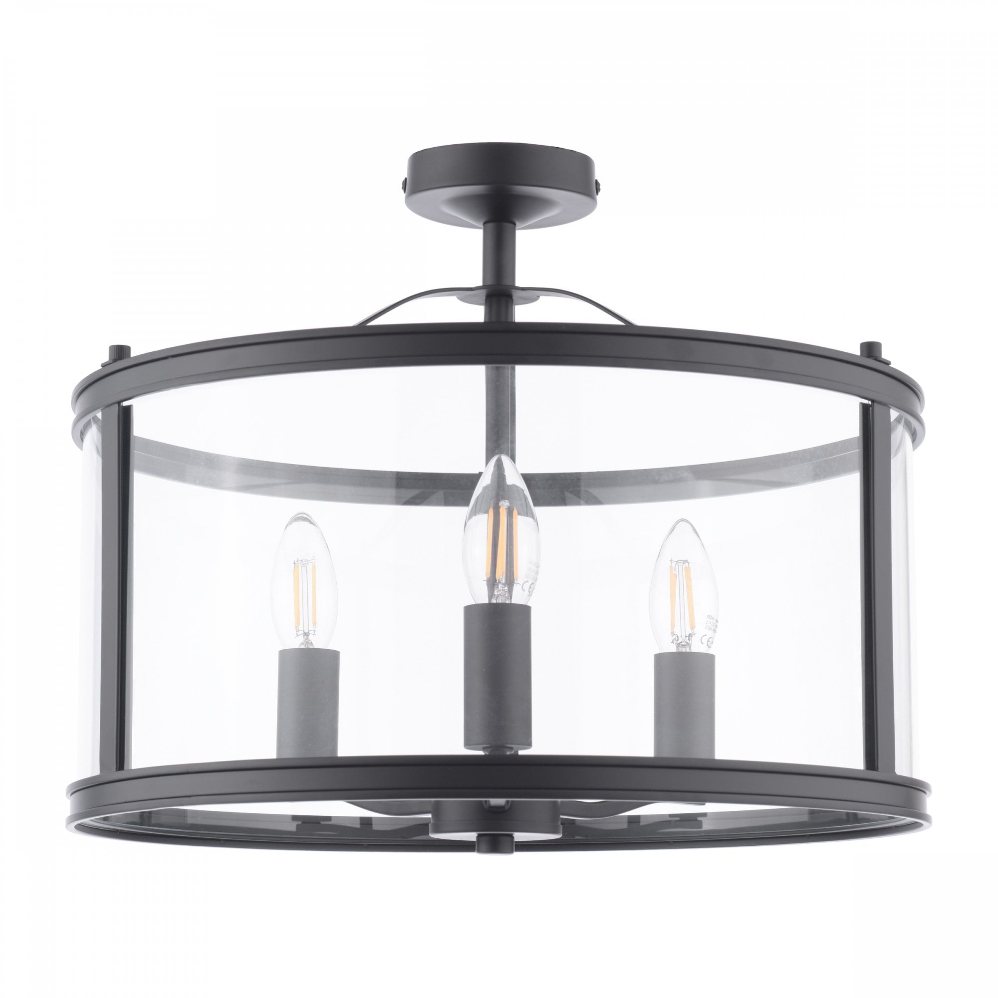 A contemporary black semi-flush light fixture with a clear glass drum, housing three exposed bulbs.