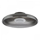 The minimalist ceiling light with a textured gray glass shade and a subtle, unlit center.