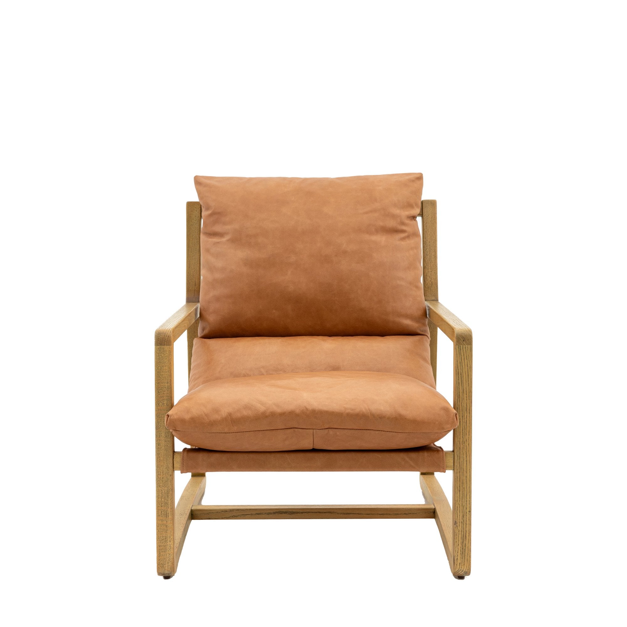 Front view of a tan leather and light wood armchair.
