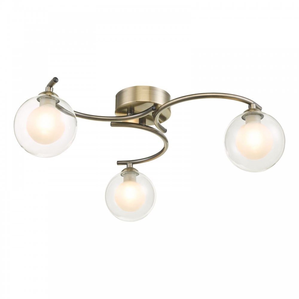 A three-light ceiling fixture with clear spherical shades and an antique brass finish.