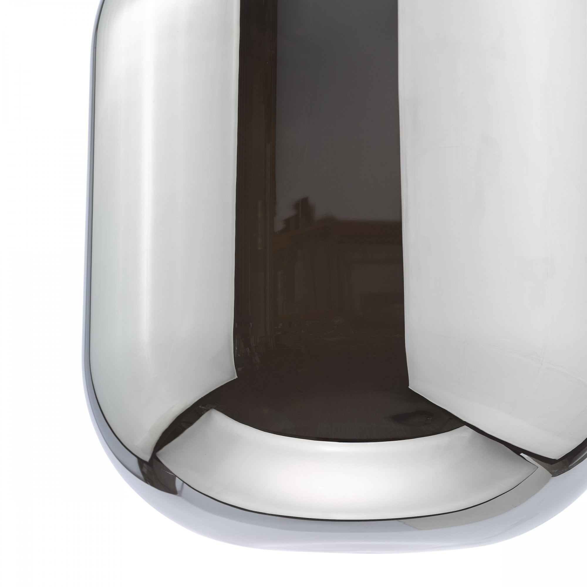 A close-up of the bottom of a reflective smoked glass pendant light.