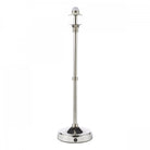 A polished nickel table lamp base without a shade, against a white background.