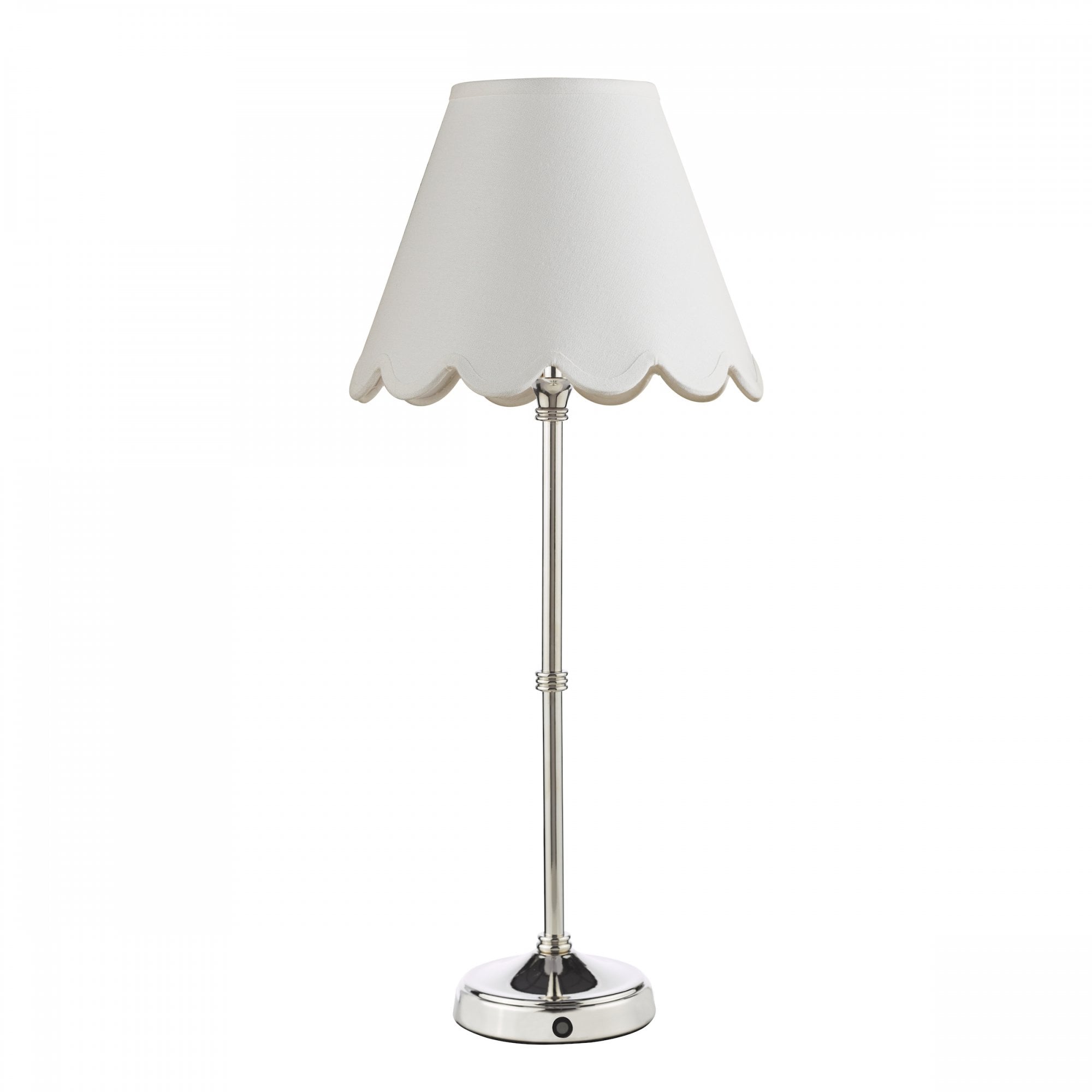 A polished nickel table lamp with a white scalloped lampshade against a white background.