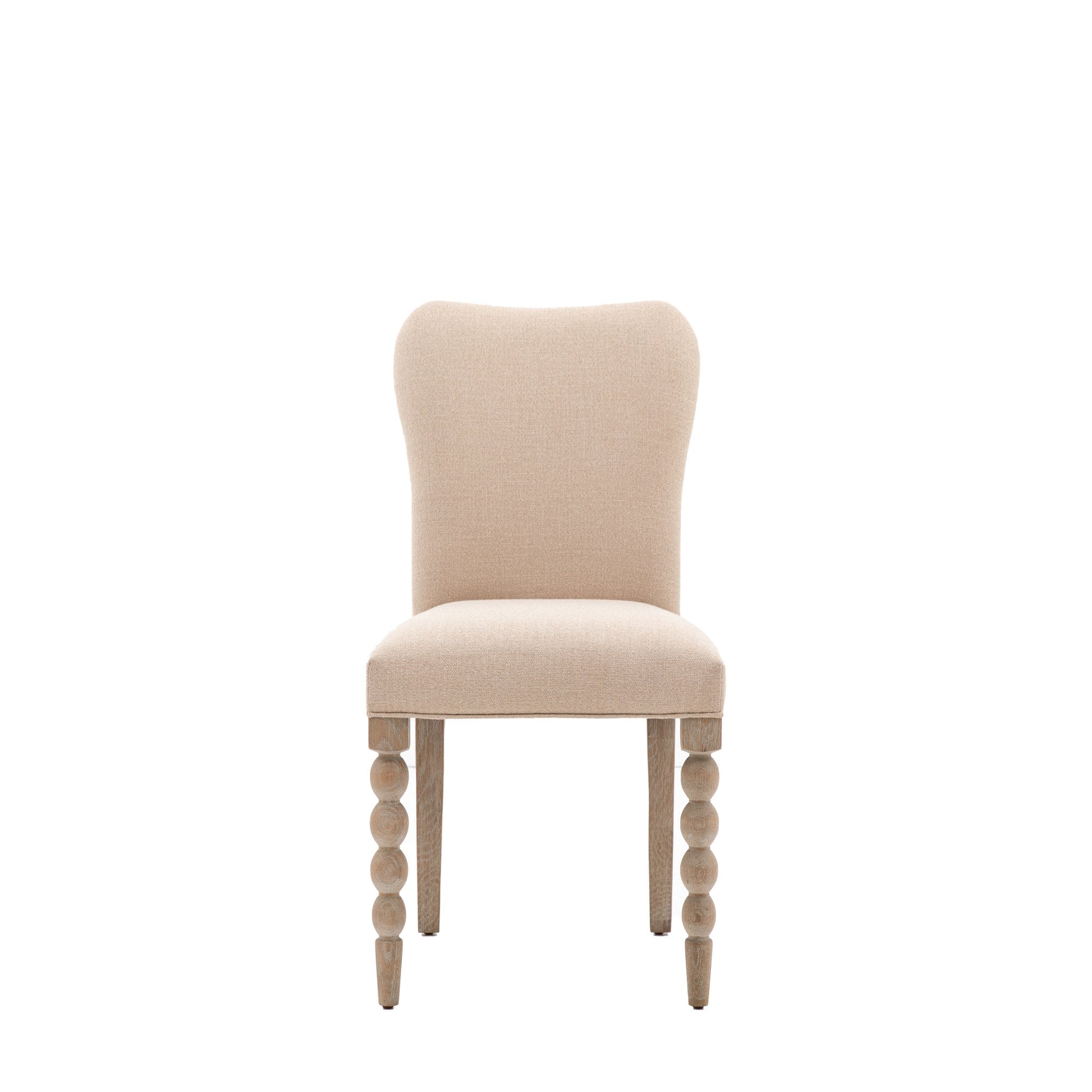 Front view of an upholstered dining chair with rounded front legs.