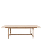 A light wood dining table with bobbin legs on a white background, viewed from the front.