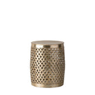 A round, metallic gold drum-shaped side table with a diamond-patterned cut-out design.