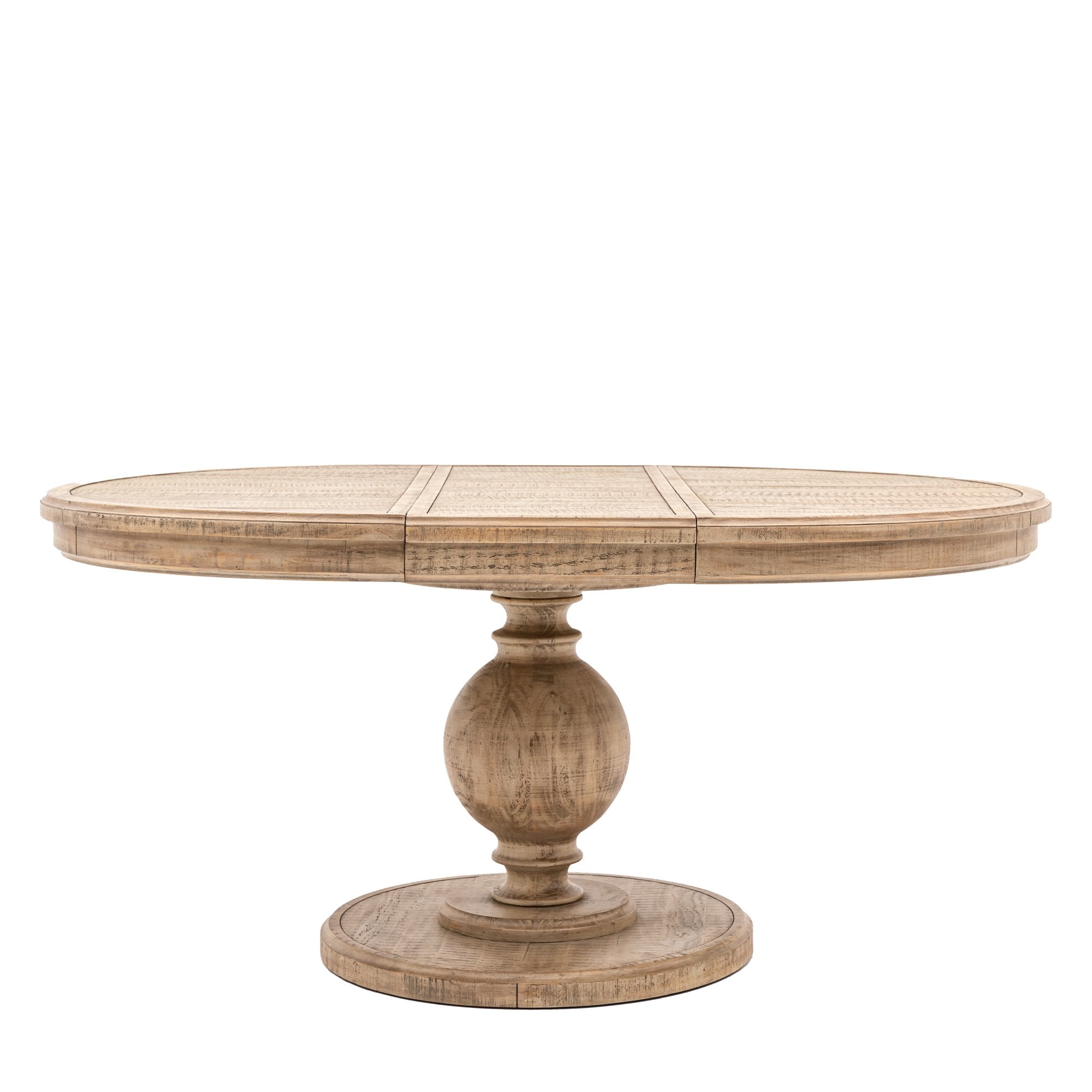 A light wood round dining table with a single pedestal base on a white background.