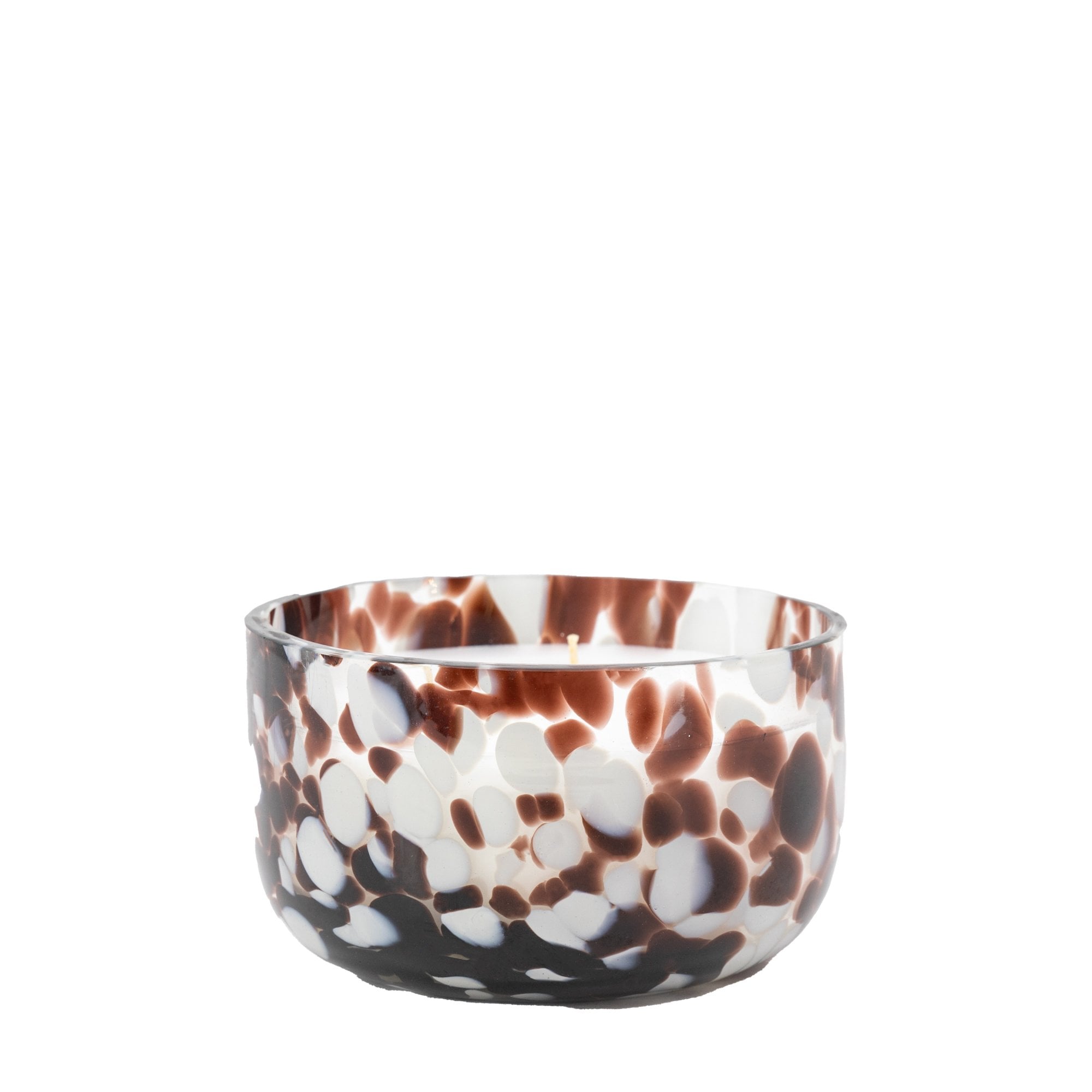 A short, wide glass candle in white with deep red and black splotches.