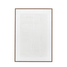 A framed piece of white and textured wall decor.