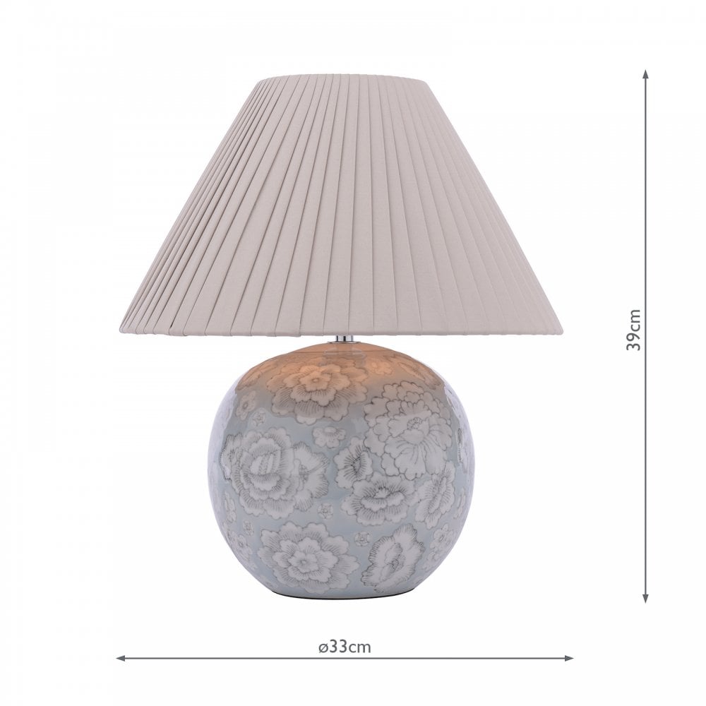 A floral globe lamp with dimensions shown, highlighting its compact size.