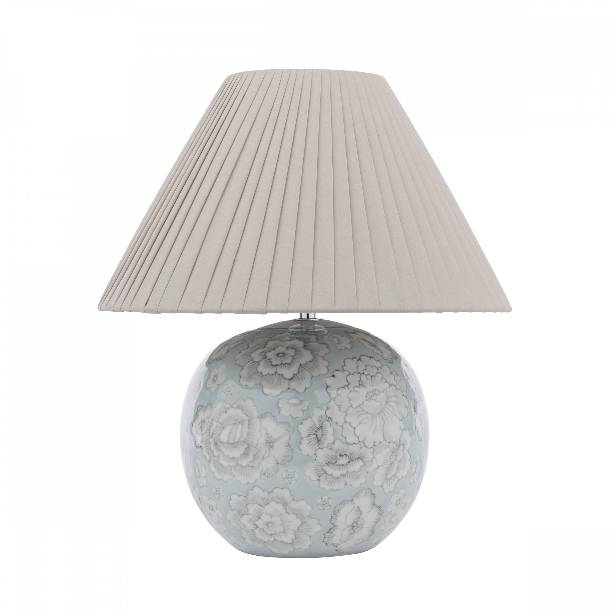 A floral globe lamp with a soft glow and a white lampshade.