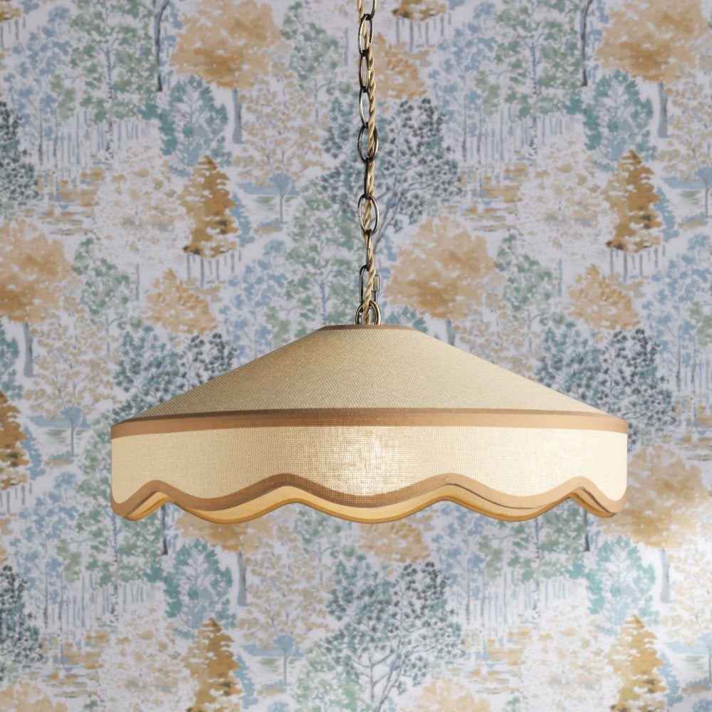 A hanging ceiling light with a cream-colored shade and a wavy trim, against a patterned wallpaper.