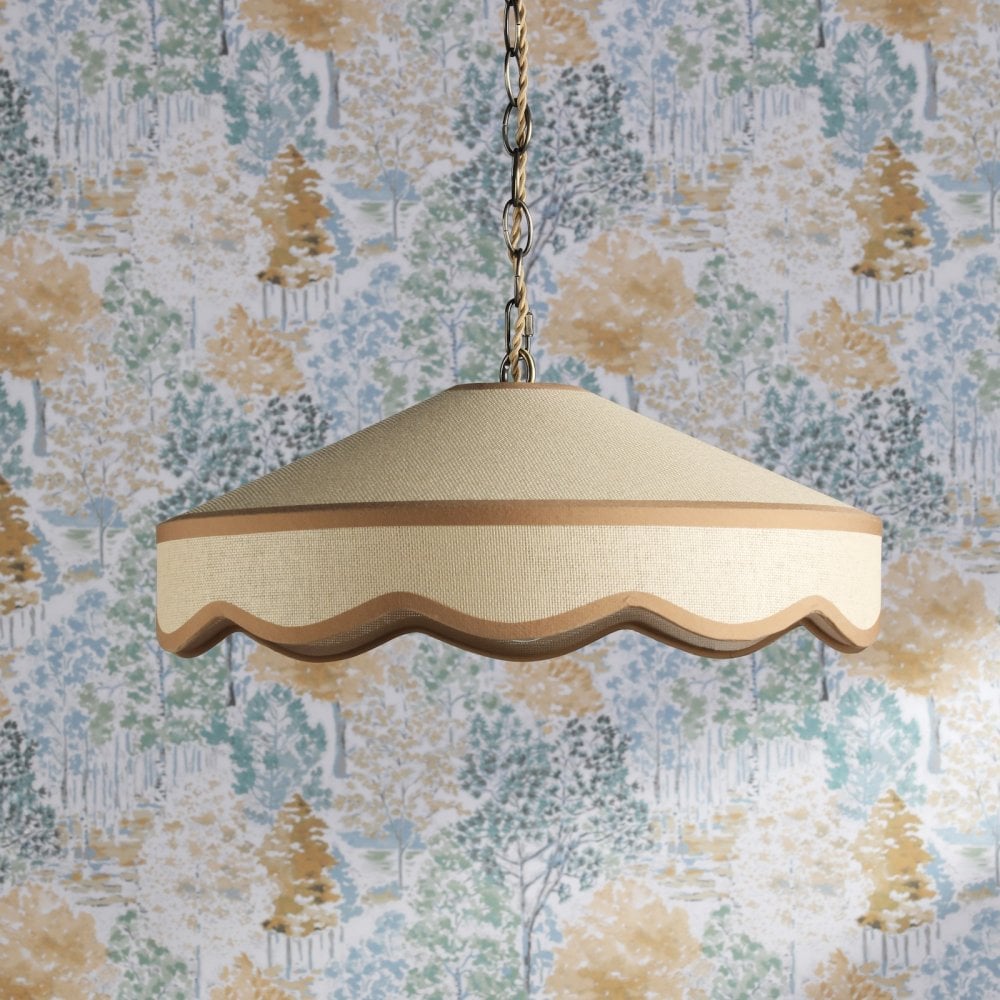 A hanging ceiling light with a cream-colored shade and a wavy trim, against a patterned wallpaper.