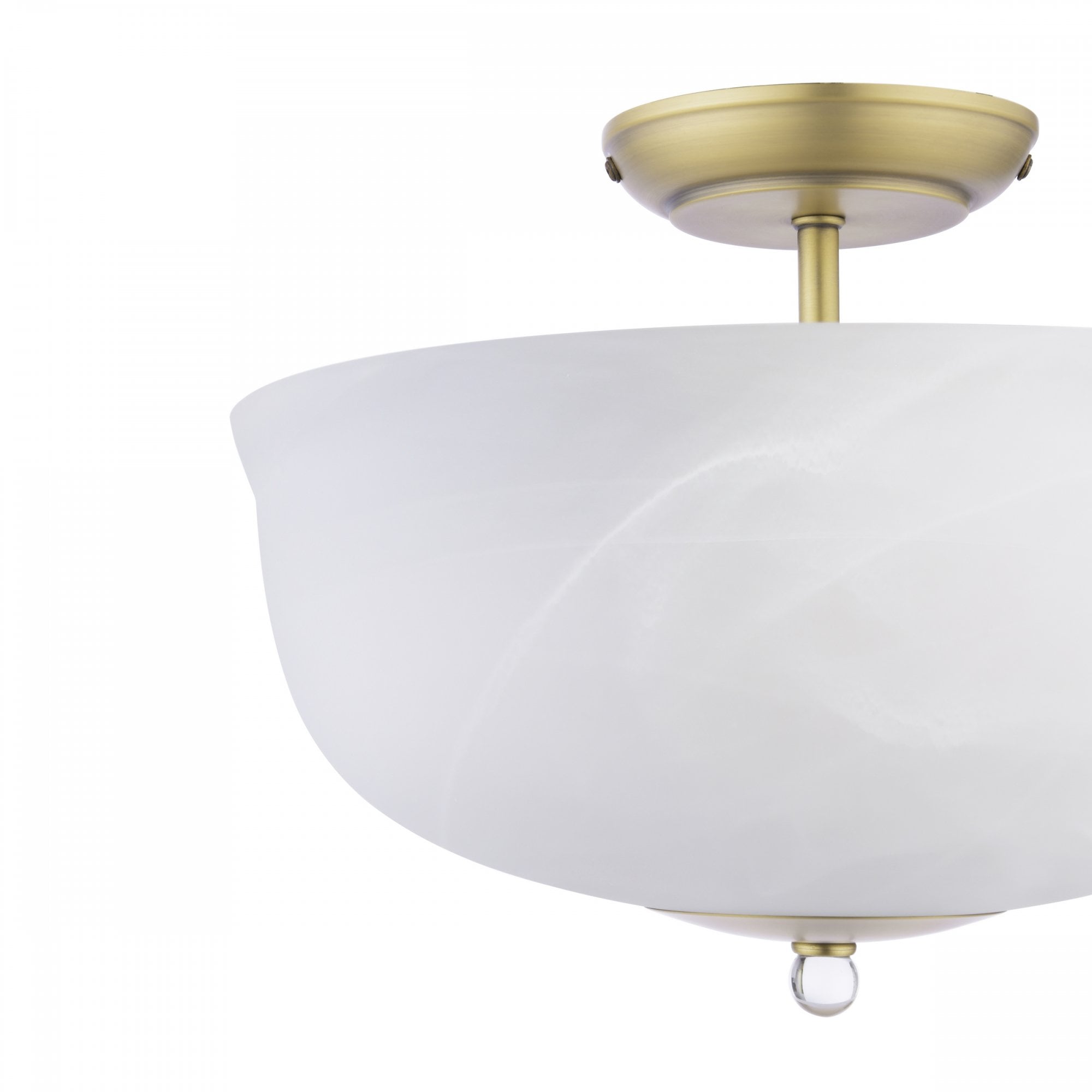 Close-up of a semi-flush ceiling light with a brass base and a white marbled glass shade.