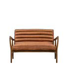Front view of a tan leather armchair with wooden frame on a white background.