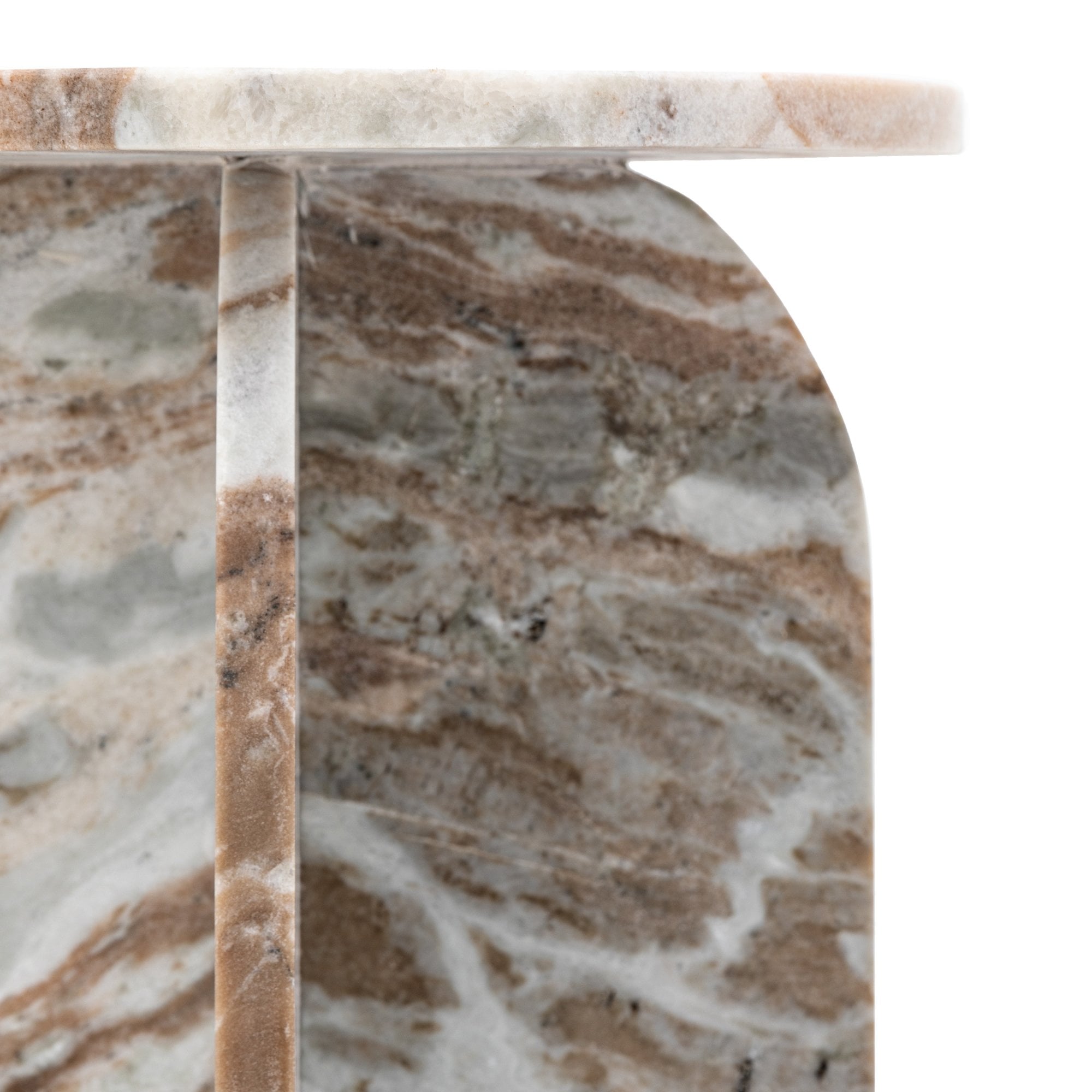 Close-up of the marble table's side, showing its intricate veining and curved arch.