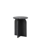 A black marble side table, showcasing its three-legged arched base from the side.