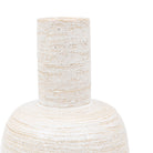 A close-up of the beige glazed vase with a textured matte base.