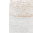 Close-up of the textured glaze and matte finish on the beige vase.