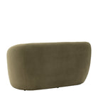 Back view of the sage green velvet sofa with a gently curved silhouette.