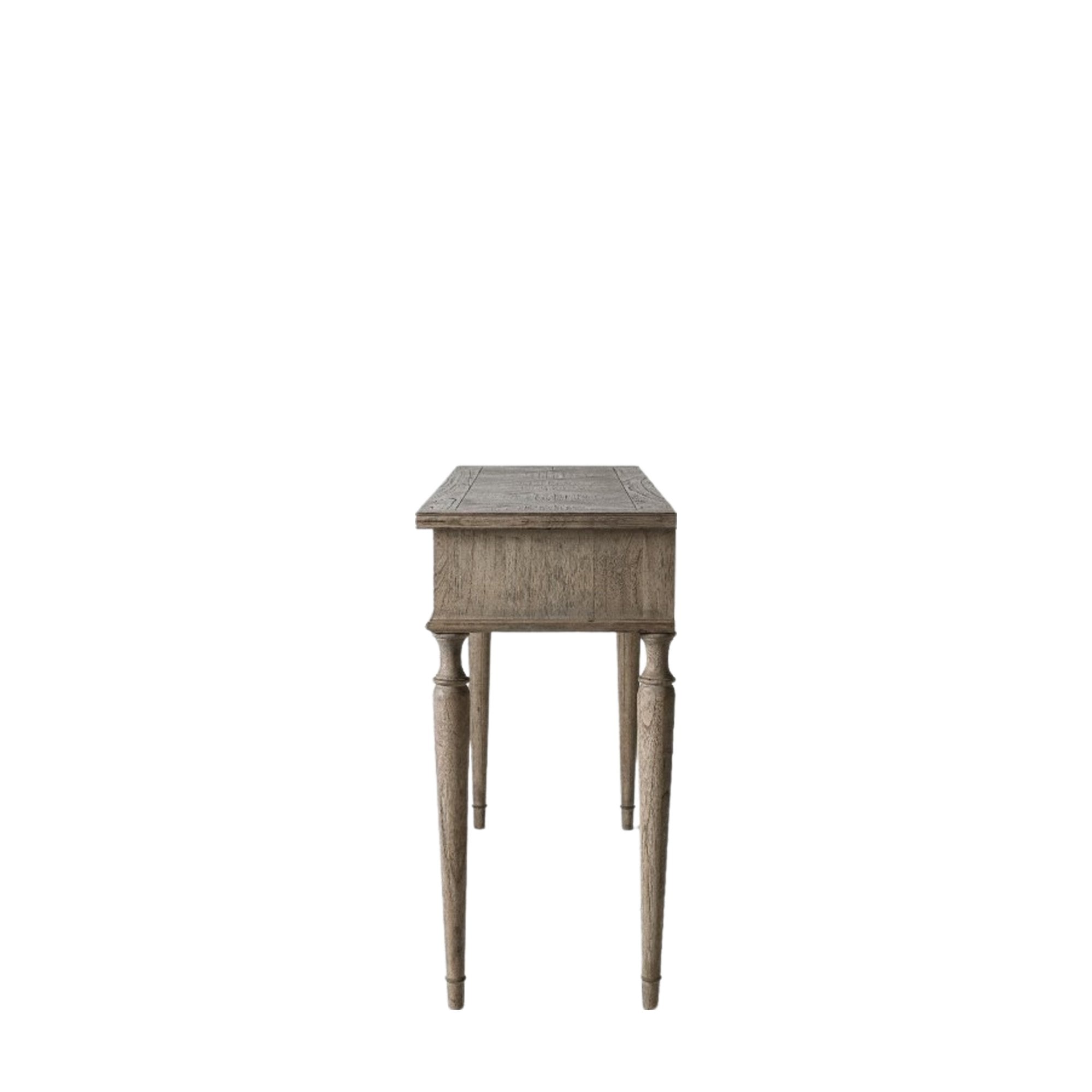 Side view of the dressing table with elegantly turned legs on a white background.