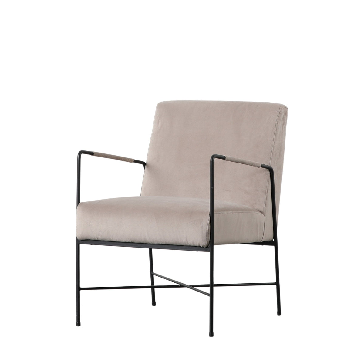 Angled view of a beige armchair with a black metal frame and light arm wraps.