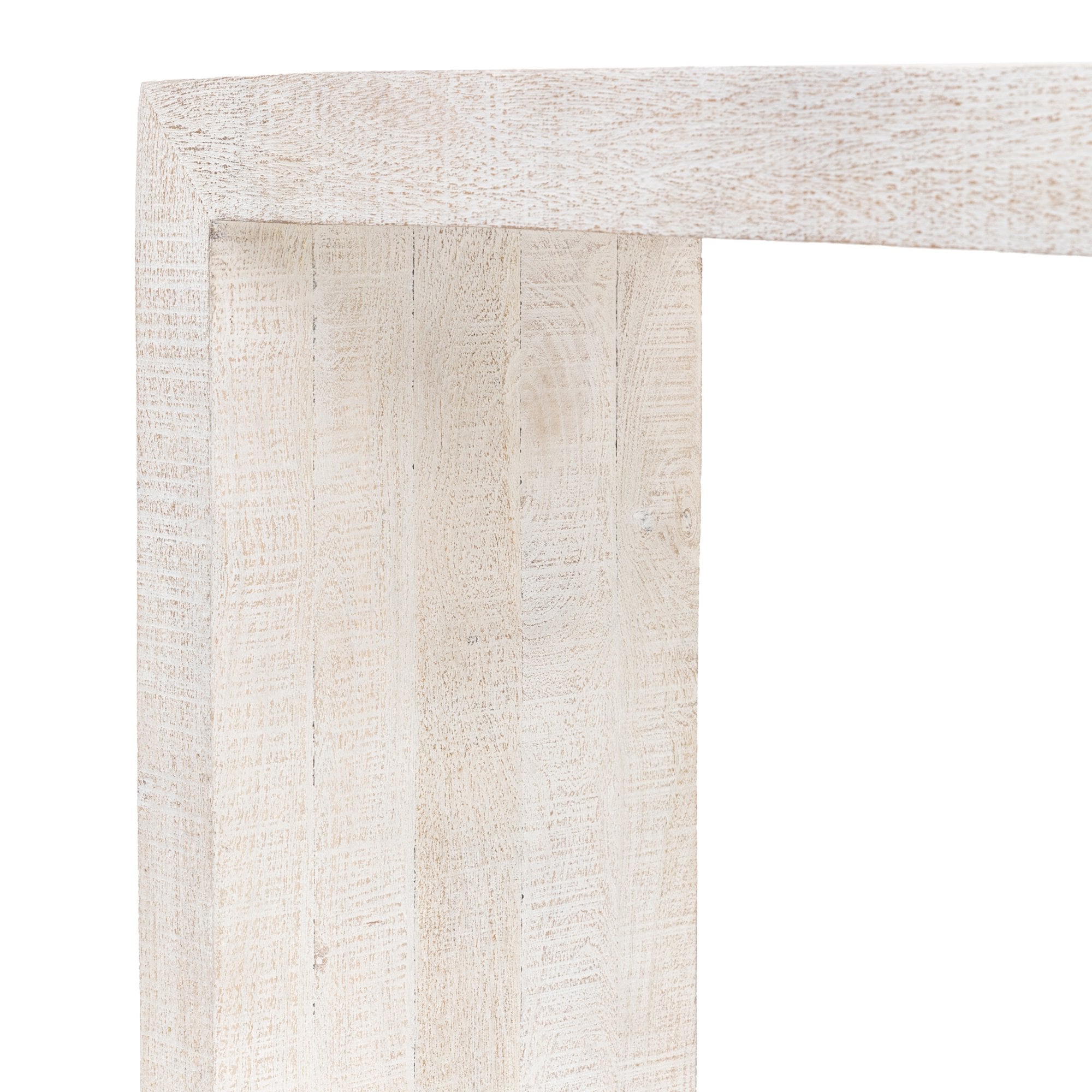 A close-up of the corner and side of a white console table, highlighting the textured finish.