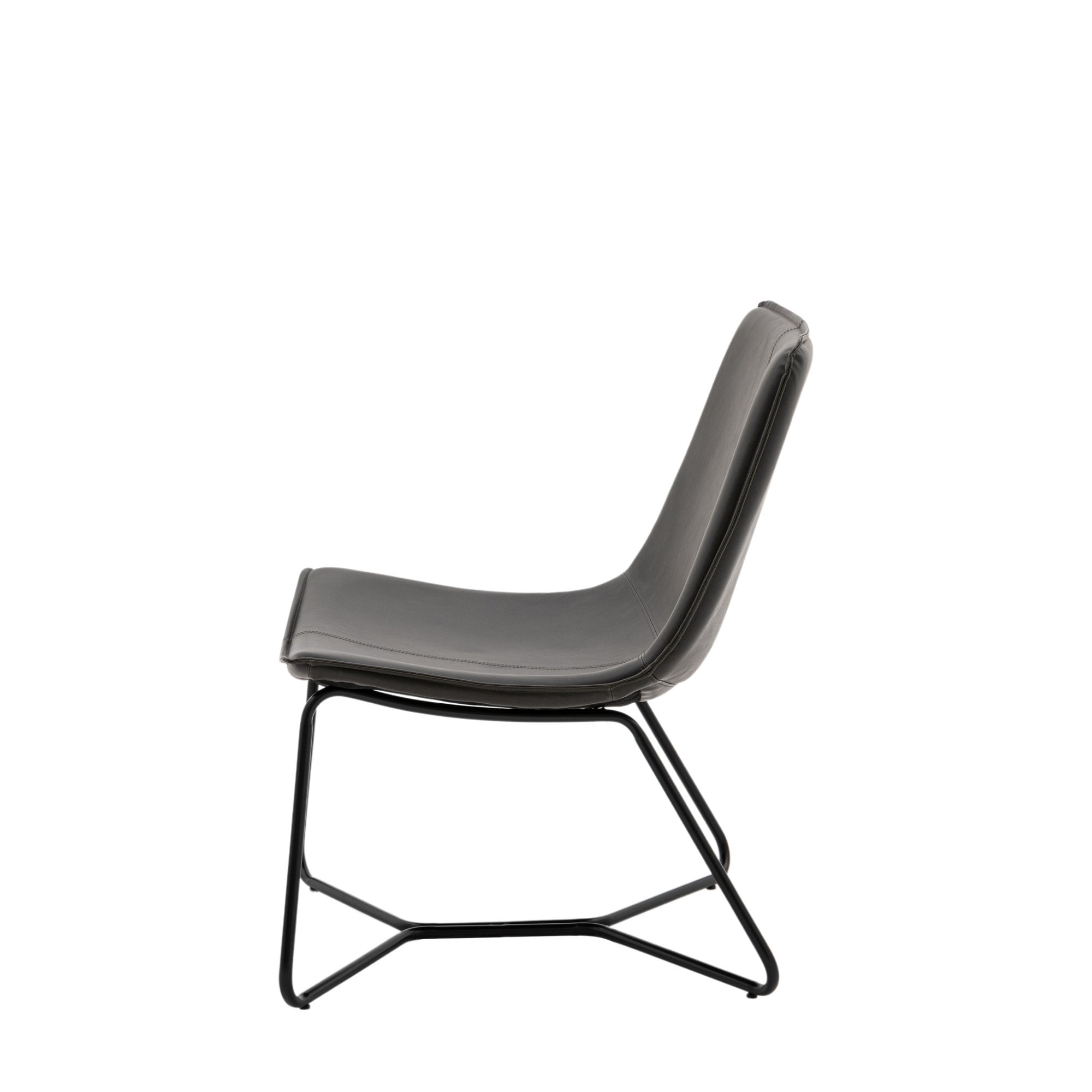 Side profile of a contemporary black leather lounge chair with metal legs.
